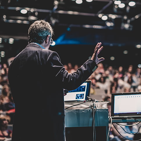 A presenter at a conference